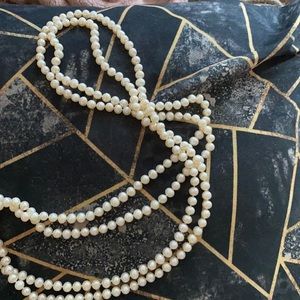 60” white pearl necklace